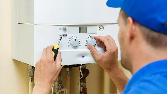 One of our team repairing a boiler